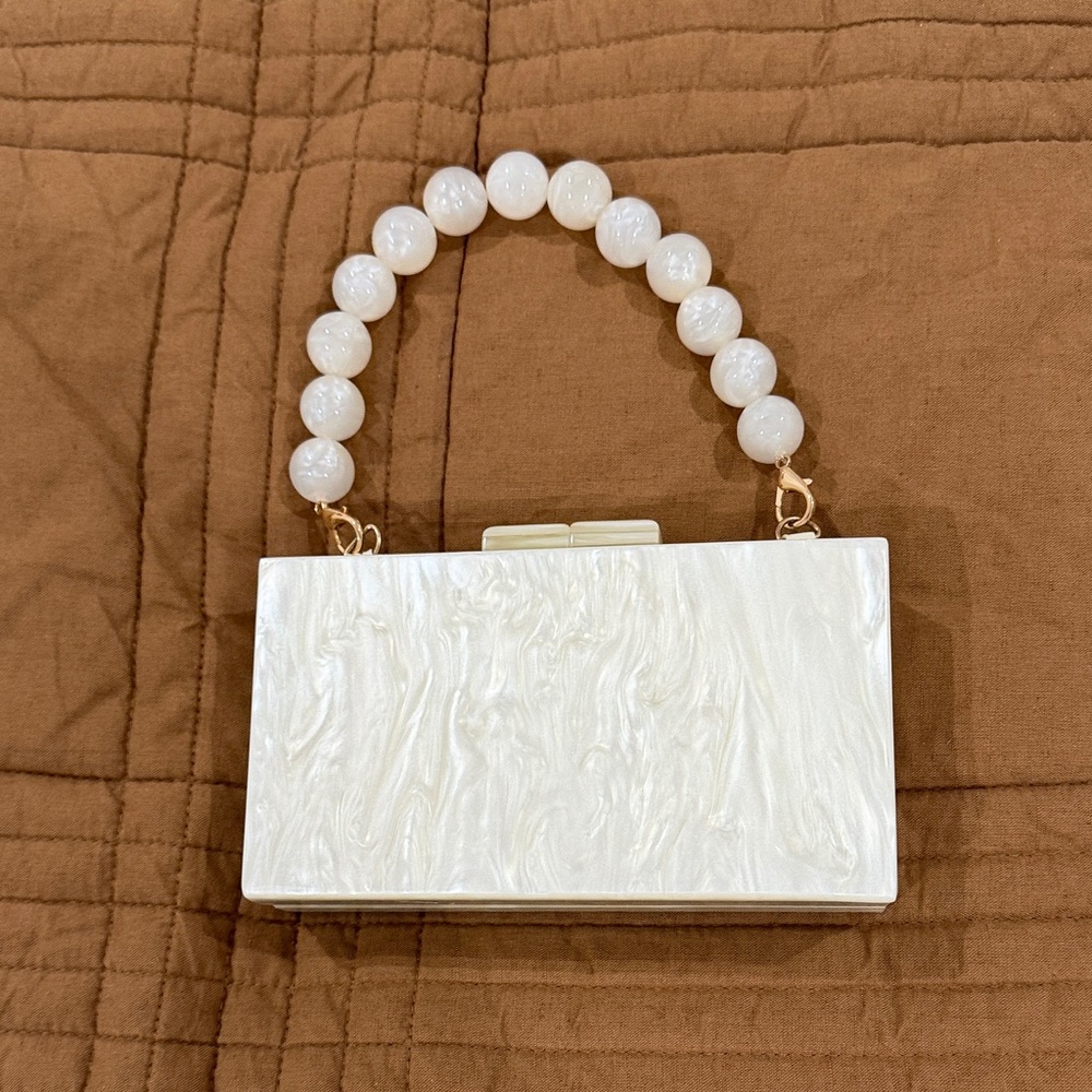 a new day Ivory Clutch with Pearl Handle
